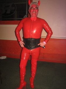 Horny red devil in latex